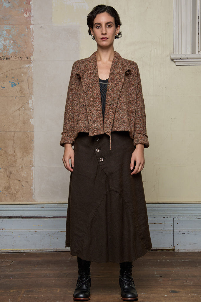 Front view of knitted wool cropped jacket in rust, army and cream melange, designed by Wendy Voon, knitted in Melbourne.