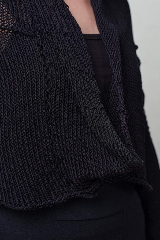 Close up fabric view black cotton cropped jumper, designed and knitted in Melbourne by Wendy Voon knits