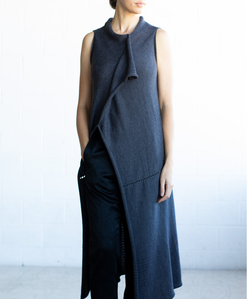 Front full length view of Asymmetric Longline vest design by Wendy Voon knits in charcoal merino wool