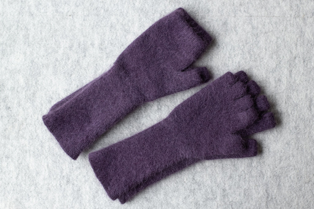 Purple coloured fingerless gloves and sloves, knitted in an angora and lambswool blend