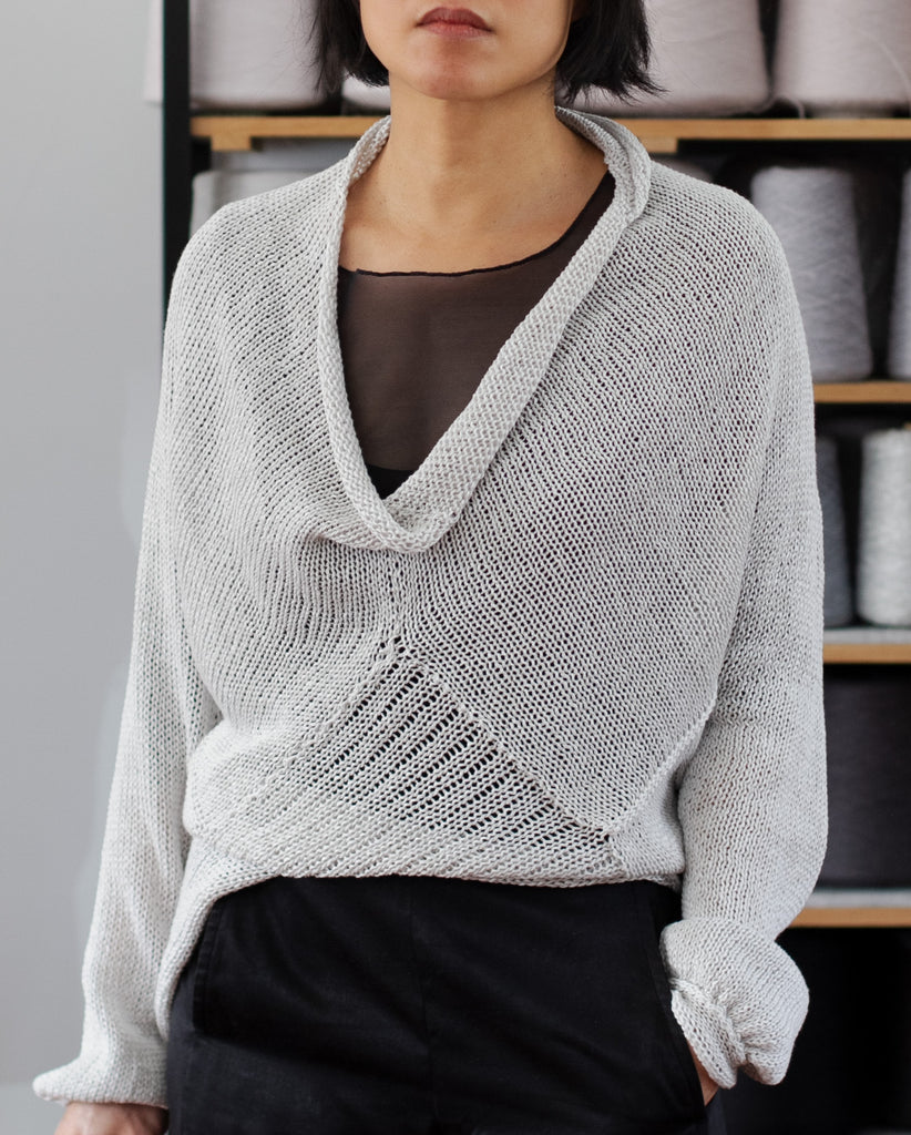Front view of pearl coloured cotton back scoop jumper, worn upside down,designed and knitted by Wendy Voon knits.