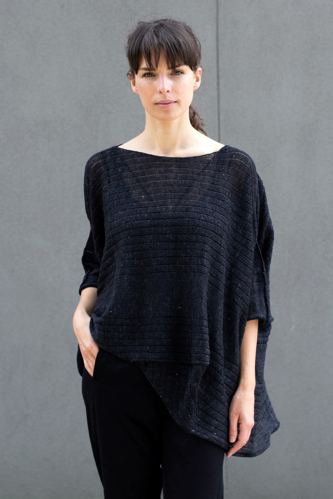 Front view of tulip shaped top in charcoal flecked linen and merino wool blend, designed by Wendy Voon.