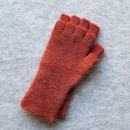 Terracotta coloured fingerless gloves, knitted in an angora and lambswool blend