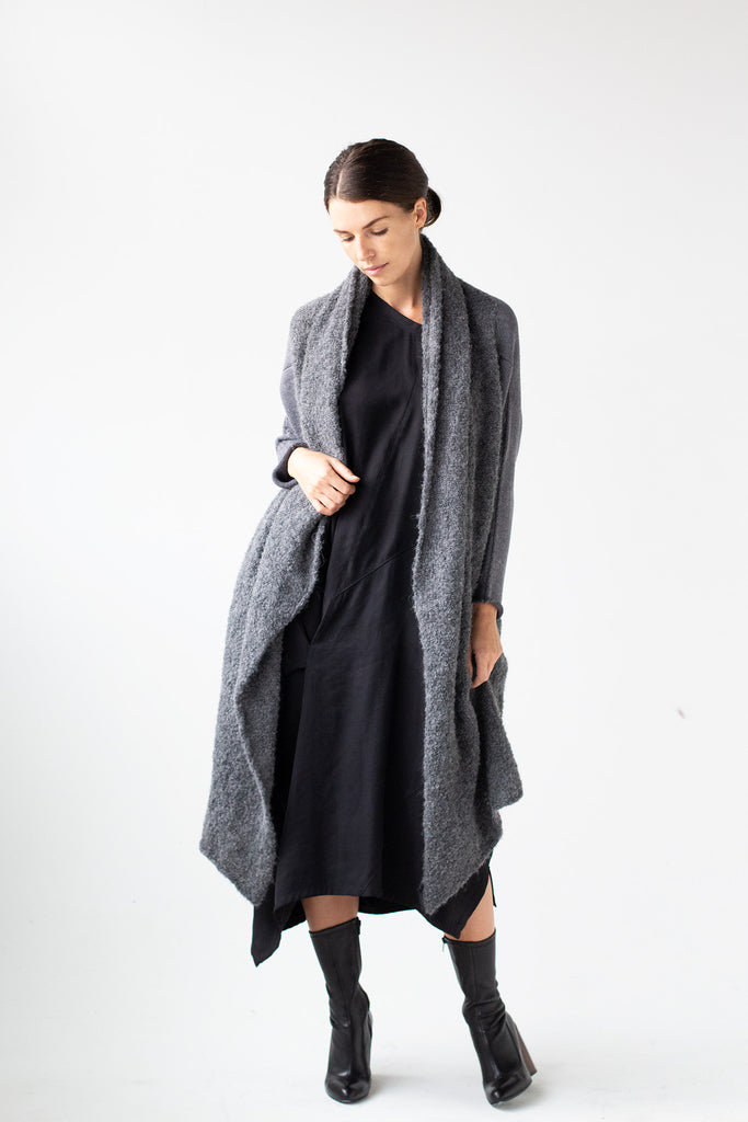 Full length front view of Logical Progression Coat by Wendy Voon in storm grey merino and alpaca, worn long and open fronted