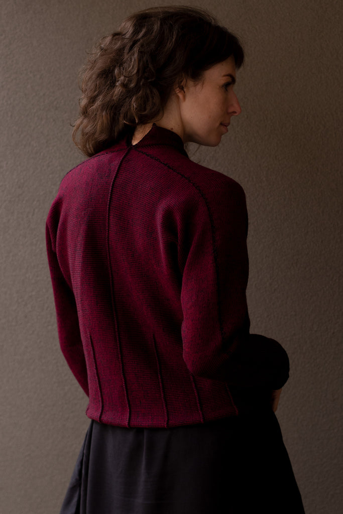 Back view of Welted  Cardigan design by Wendy Voon knits in burgundy and black merino wool
