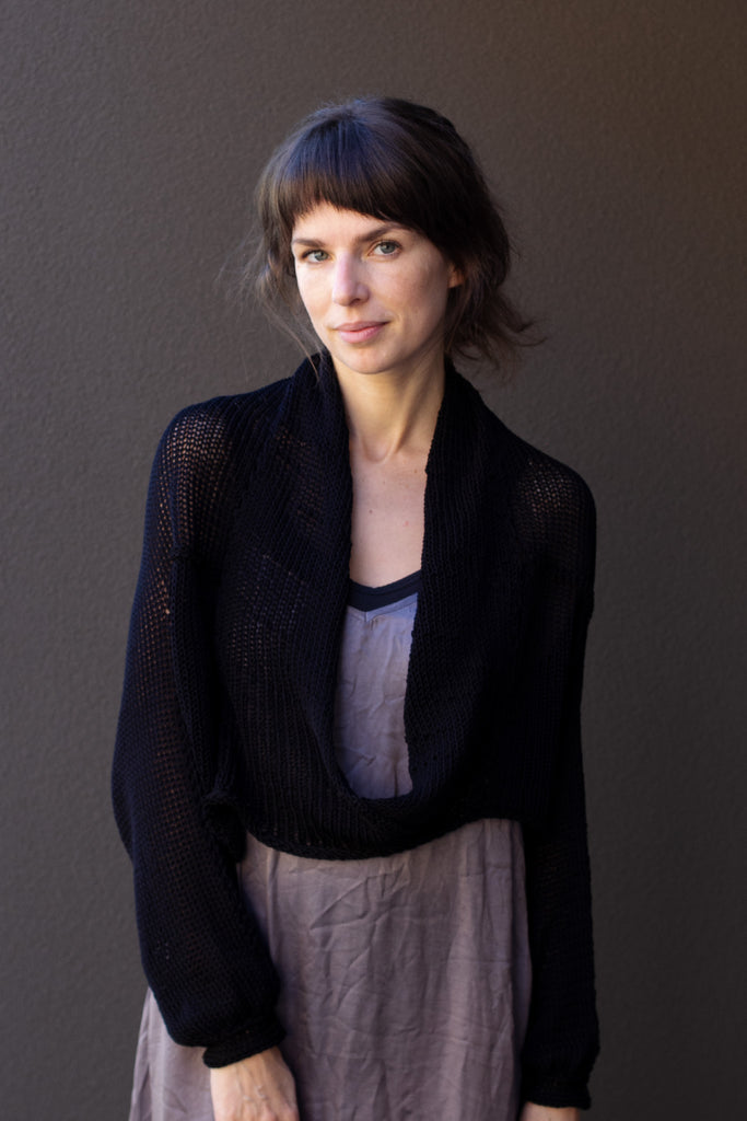 Front view of cotton cropped jumper in black colour way, worn with shawl collar, designed and made in Melbourne by Wendy Voon