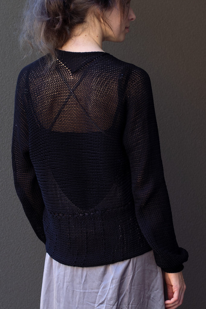 Back view of cotton cropped jumper in black colour way, worn upside down, designed and made in Melbourne by Wendy Voon