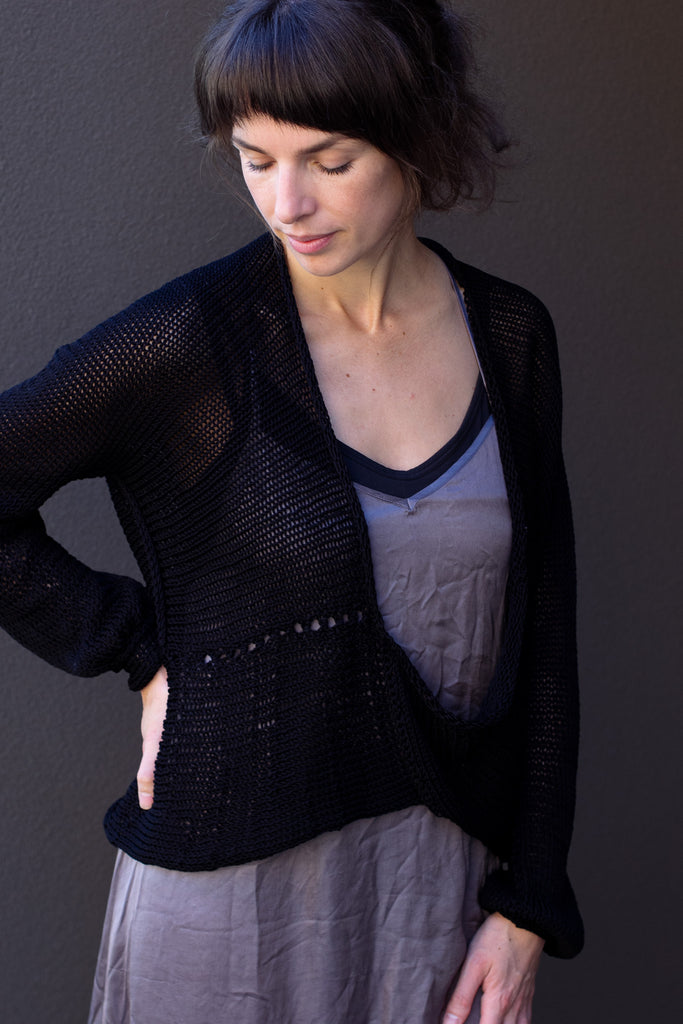 Front view of cotton cropped jumper in black colour way, worn upside down, designed and made in Melbourne by Wendy Voon