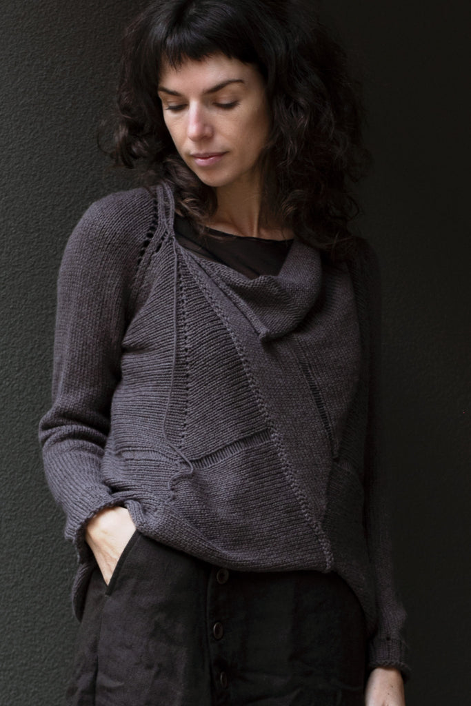 Front view of taupe superfine merino wool/polyamide jumper, designed by Wendy Voon knits, made in Melbourne.  Jumper features triangular panels at front with loose threads left as design feature