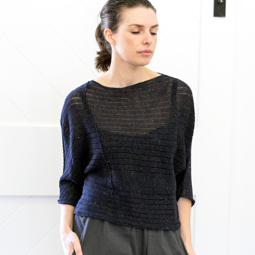 Front view of Linen Laddered Batwing jumper design by Wendy Voon in charcoal flecked linen and merino, showing seam detail
