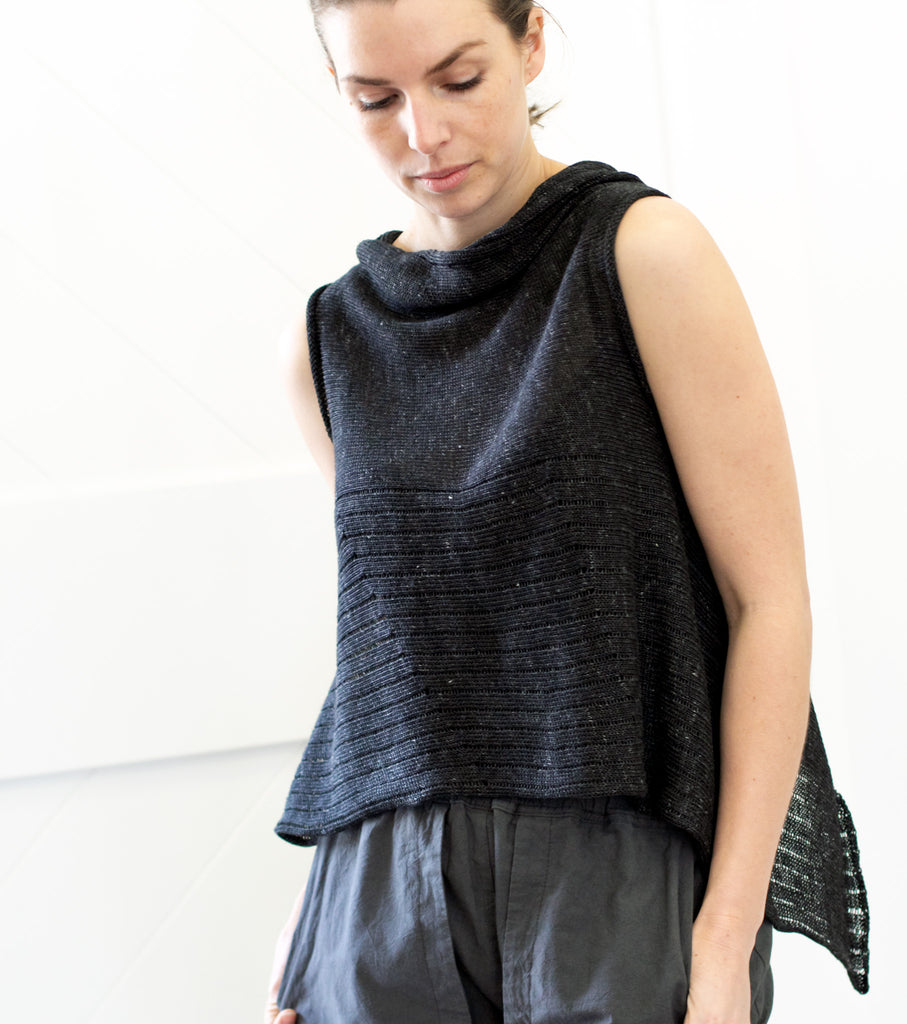 Front view of Linen Laddered Vest design by Wendy Voon in charcoal flecked linen, worn back to front in a cropped vest style