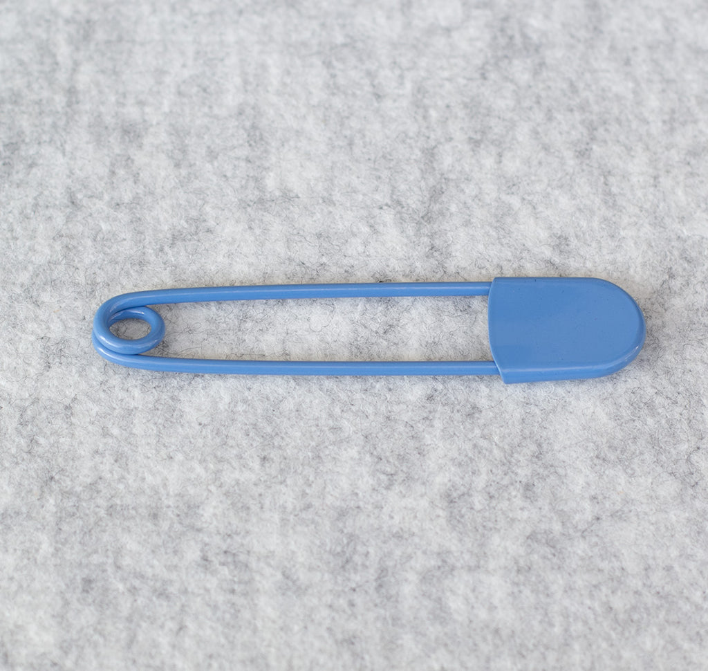 Giant safety pin in blue