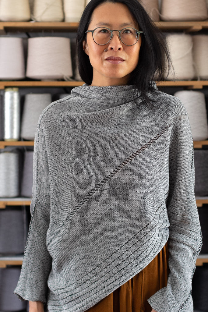 Front view of linen bias jumper in silver grey colourway backed with black, designed and knitted in Melbourne by Wendy Voon knits