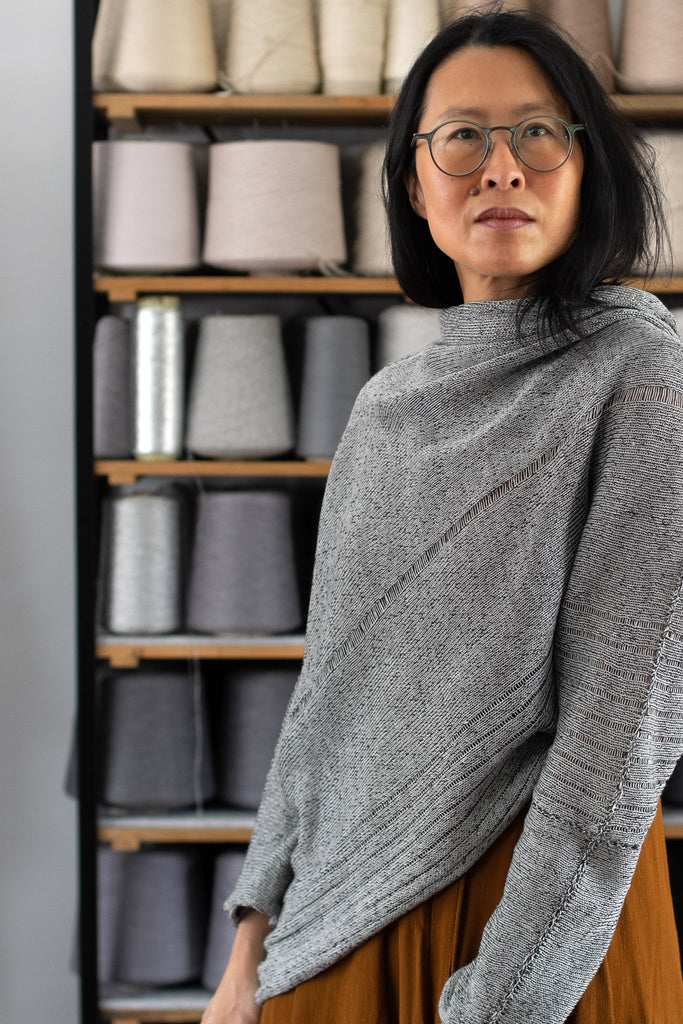 Front view of linen bias jumper in silver grey colourway backed with black, designed and knitted in Melbourne by Wendy Voon knits