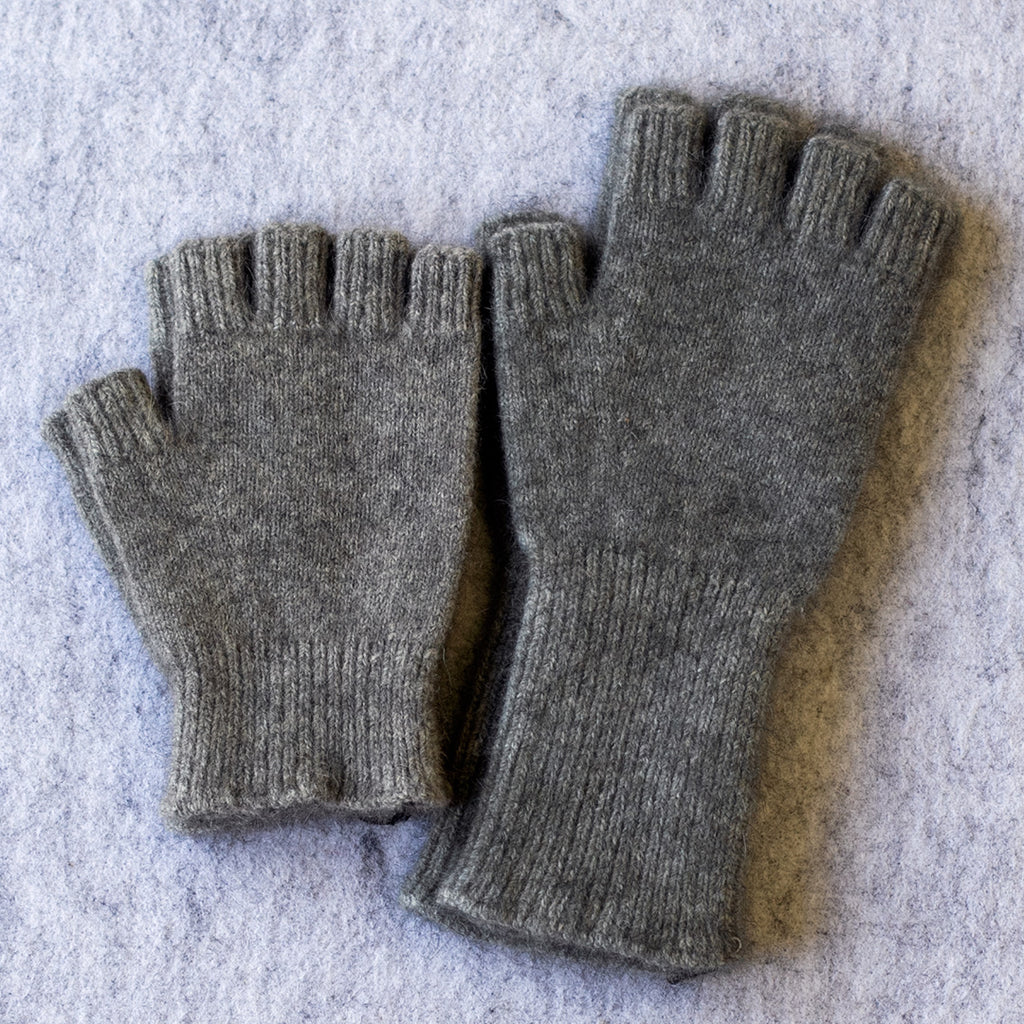 Light Grey coloured fingerless gloves in a merino wool, possum and silk blend
