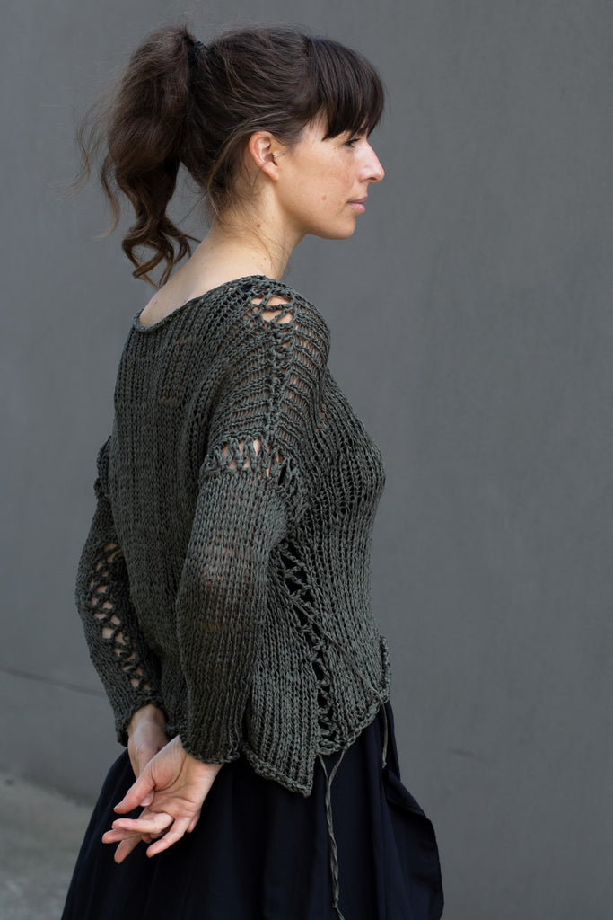 Side view of extra large stitch jumper in khaki, designed by Wendy Voon