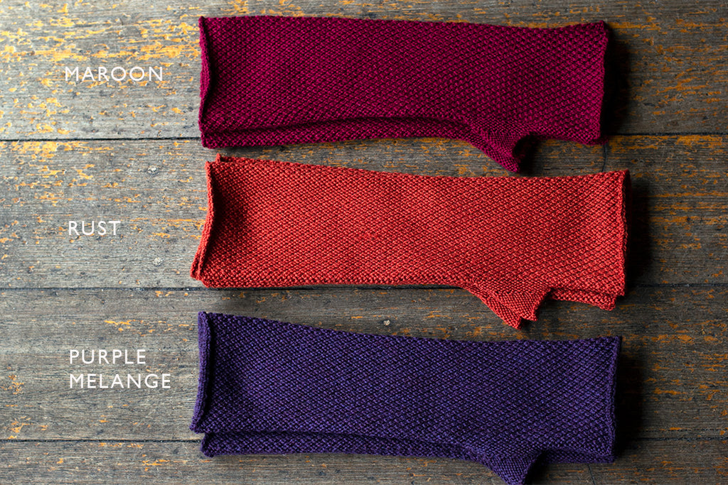 Arm warmers in maroon, rust and purple melange, made from superfine merino wool